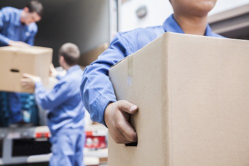 House removals planning in Redbridge with packed boxes and moving equipment