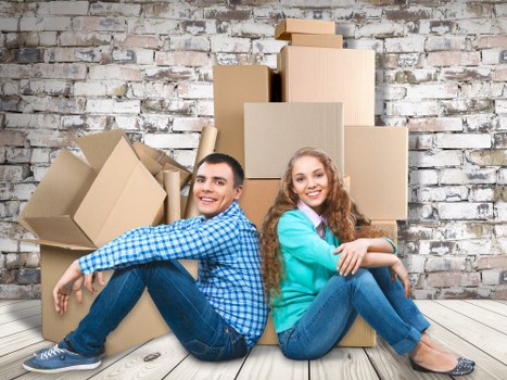 Family settling into a new home after moving in Redbridge