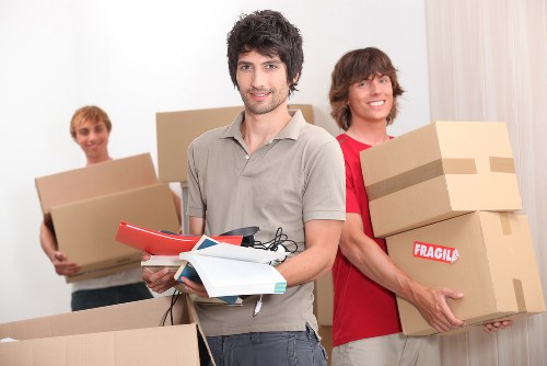 Local removalists handling furniture and boxes for a Redbridge home move