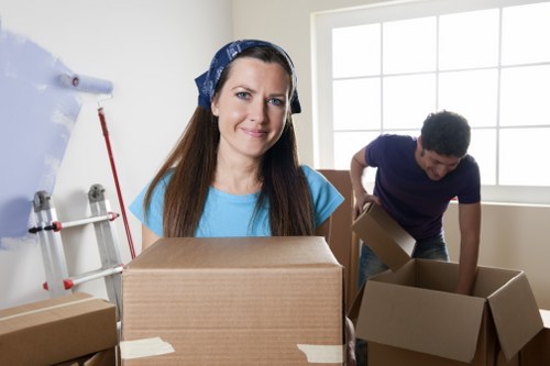 Packed moving boxes prepared for a home move in Redbridge