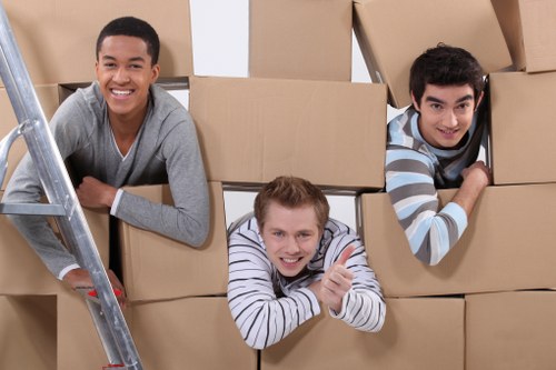 Unpacking boxes and organizing a new home in Redbridge
