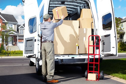 Busy moving team loading a van in Redbridge