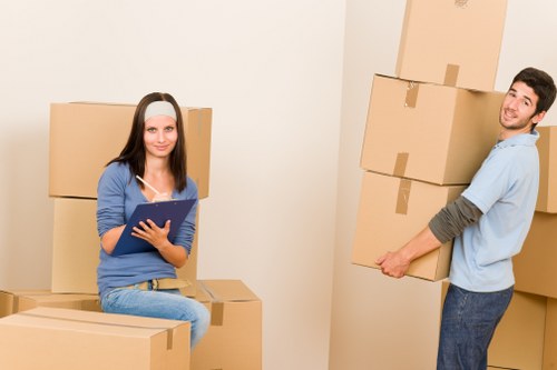 Packing and labeling boxes for house removals in Redbridge